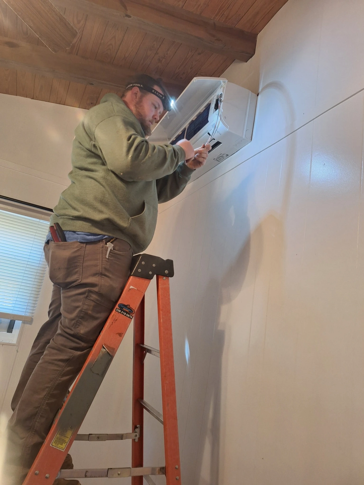 Dependable HVAC technician servicing mini-split in Pee Dee