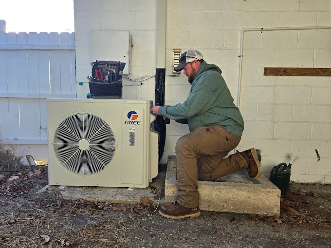 Professional outdoor ductless heat pump unit installation